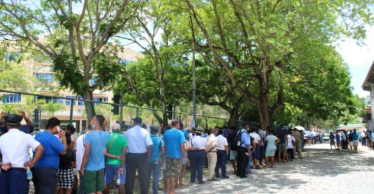 Seychelles voters prepare to cast ballots at the English River polling station in Victoria, kicking off three days of voting. By Rassin VANNIER (AFP)