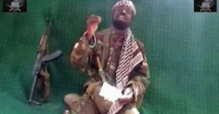 A grab made on May 29, 2013 from a video obtained by AFP shows Abubakar Shekau. By (Boko Haram/AFP)