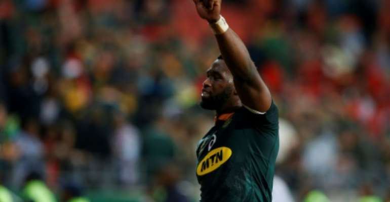 Siya Kolisi South Africa's black captain lifting the Rugby World Cup trophy would be a hugely symbolic moment former Boks assistant coach Alan Solomons told AFP. By GIANLUIGI GUERCIA (AFP)