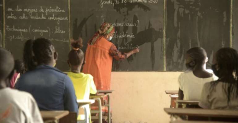 Some four million primary- and secondary-school pupils were meant to return to classrooms. By Seyllou (AFP)