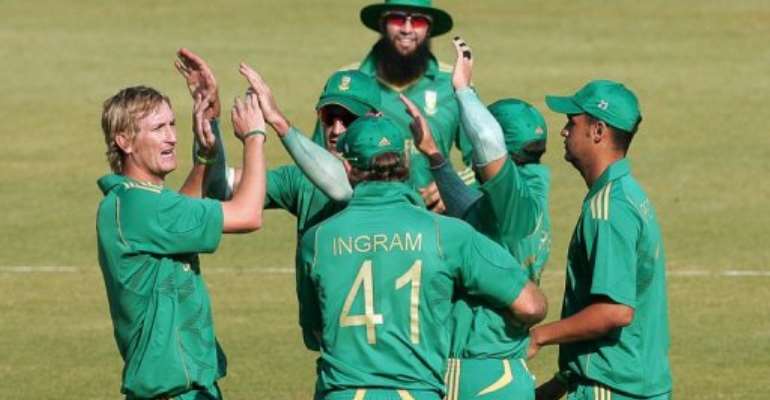 South Africans celebrate a wicket against Zimbabwe at the weekend. By Jekesai Njikizana (AFP/File)