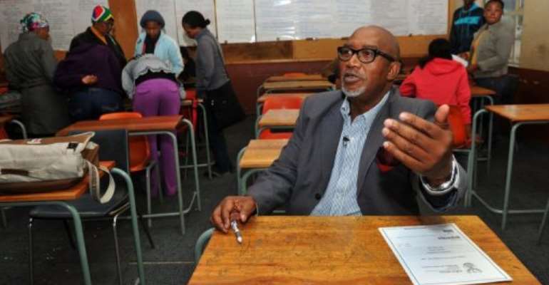 On week nights, massively popular Sipho 'Hotstix' Mabuse is in a classroom near his Soweto home. By Alexander Joe (AFP/File)