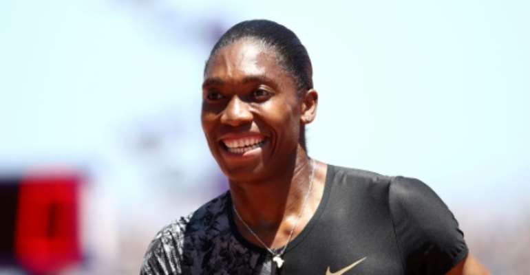 South Africa's Caster Semenya smiles after winning the women's 800m at the Prefontaine Classic Diamond League meeting, but says she'll skip the World Championships if she loses her legal battle with the IAAF regarding testosterone levels in female athletes. By EZRA SHAW (GETTY IMAGES NORTH AMERICA/AFP)