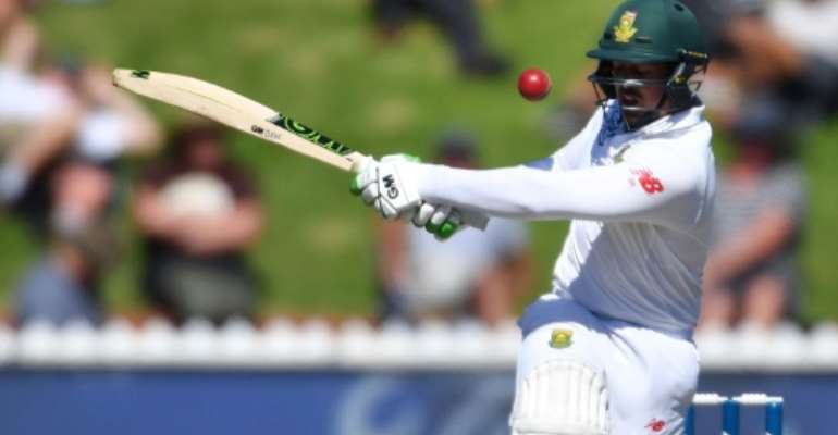 South Africa's keeper Quinton de Kock races to his eighth Test 50 in 55 balls in the second Test against New Zealand in Wellington. By Marty MELVILLE (AFP)