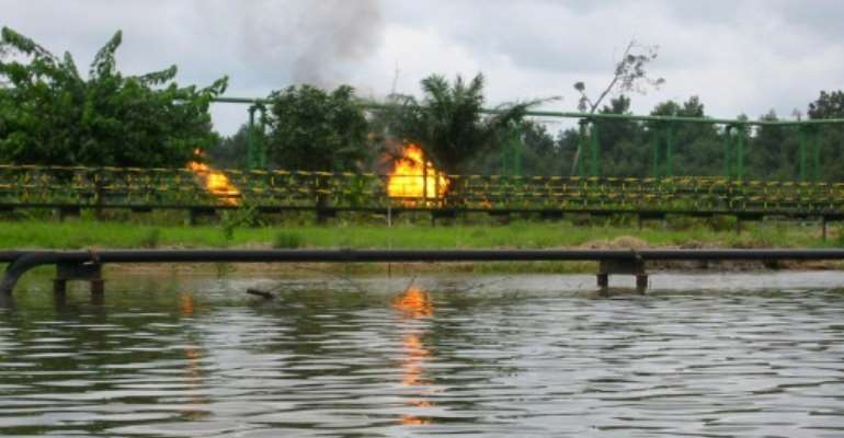 A spate of attacks claimed by the Niger Delta Avengers has hit oil production in Nigeria, exacerbating a financial crisis caused by low global crude prices since mid-2014. By Dave Clark (AFP/File)
