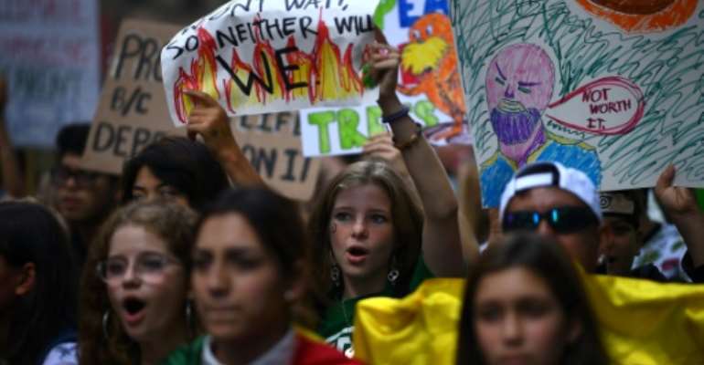 Students participate in the Global Climate Strike march on September 20, 2019 in New York. By Johannes EISELE (AFP)