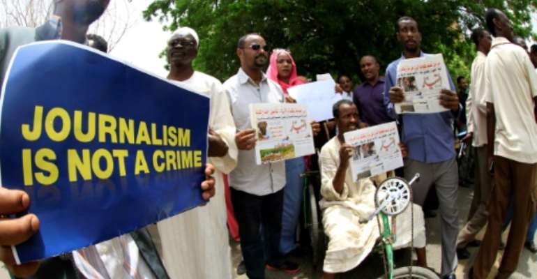 Sudanese journalists protest in Khartoum on July 20, 2014. By ASHRAF SHAZLY (AFP/File)
