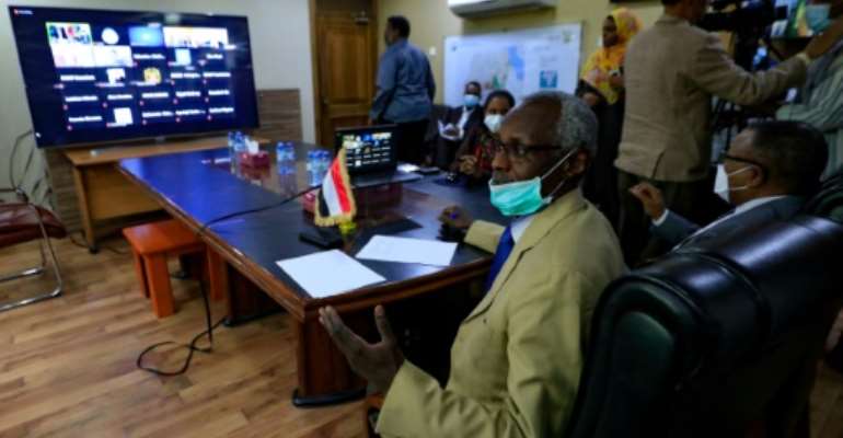 Sudan's Minister of Irrigation and Water Yasser Abbas gestures during talks online with Egypt and Ethoipia over the Grand Ethiopian Renaissance Dam (GERD). By ASHRAF SHAZLY (AFP)