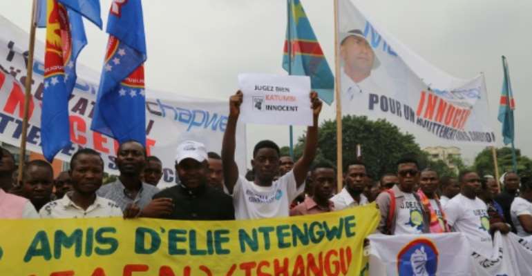 Supporters of Congolese opposition figure Moises Katumbi demonstrate in Kinshasa on June 27, 2018 in front of the Supreme Court. By SAMIR TOUNSI (AFP/File)