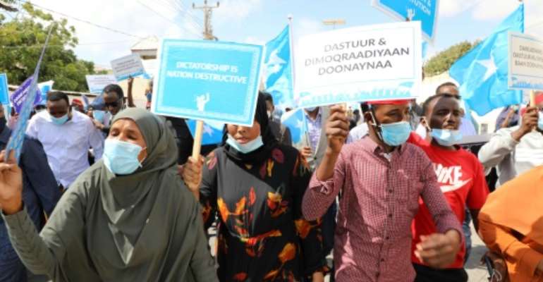 Supporters of different opposition presidential candidates demonstrate in Mogadishu on February 19, 2021. By - (AFP/File)