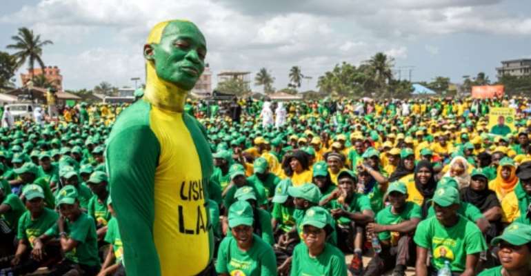 Supporters of the Tanzanian ruling party Chama Cha Mapinduzi gather at the Kibanda Maiti Stadium during the last campaign rally. By Patrick Meinhardt (AFP/File)