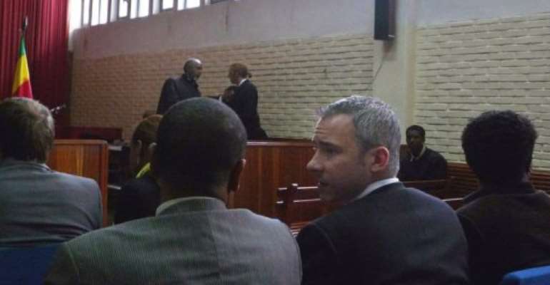 Swedish journalist Martin Schibbye (2-R), seen here at an Ethiopian courtroom, in November, in Addis Ababa. By Jenny Vaughan (AFP/File)