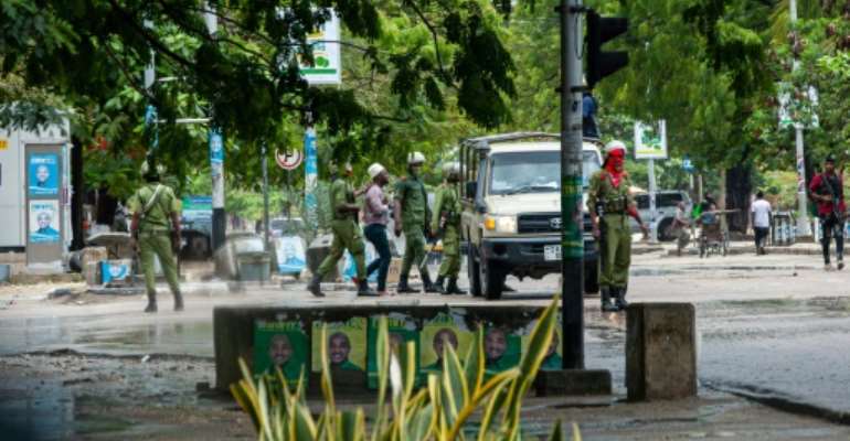 Tanzanian Security Forces arrest two people in Stone Town, Zanzibar. By Patrick Meinhardt (AFP)