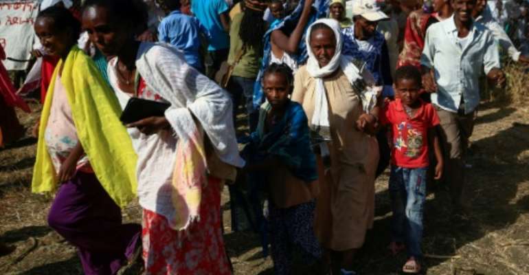 Tens of thousands have fled the fighting, crossing to neighbouring Sudan. By ASHRAF SHAZLY (AFP)