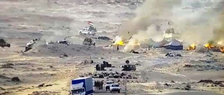Tents used by the Polisario Front ablaze near the Mauritanian border in Guerguerat in the Western Sahara, along the road leading to Mauritania, after the intervention of Moroccan armed forces, in picture supplied by the army. By - (AFP)
