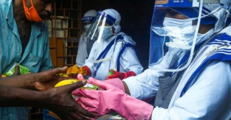 The 86,432 new cases took India to 4,023,179 infections, third behind the United States and just trailing Brazil. By Dibyangshu SARKAR (AFP)