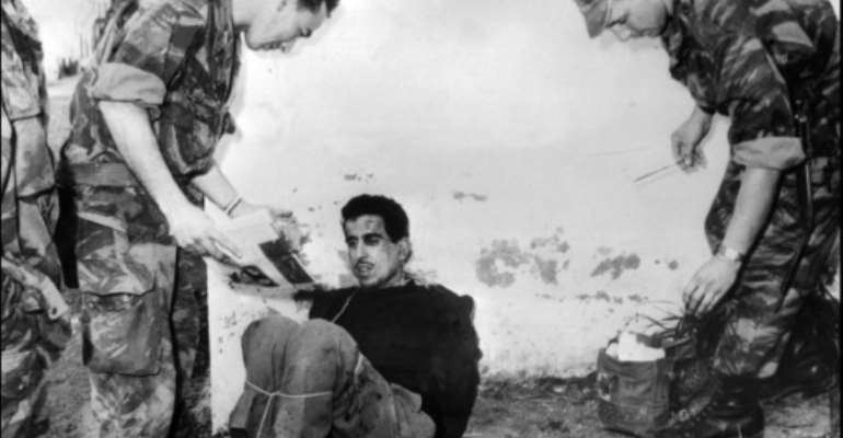 The bitter legacy of the independence war still strains relations between the two countries. By Jacques GREVIN (INTERCONTINENTALE/AFP/File)