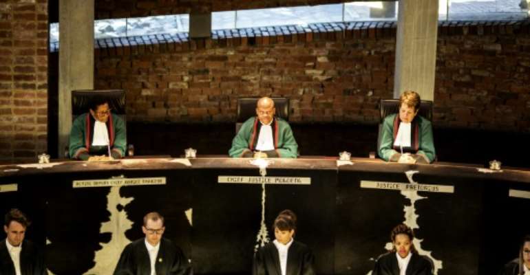 The burglary took place just hours after the Constitutional Court, headed by chief Justice Mogoeng Mogoeng, delivered a scathing ruling against the ANC government over welfare payments. By MARCO LONGARI (AFP)