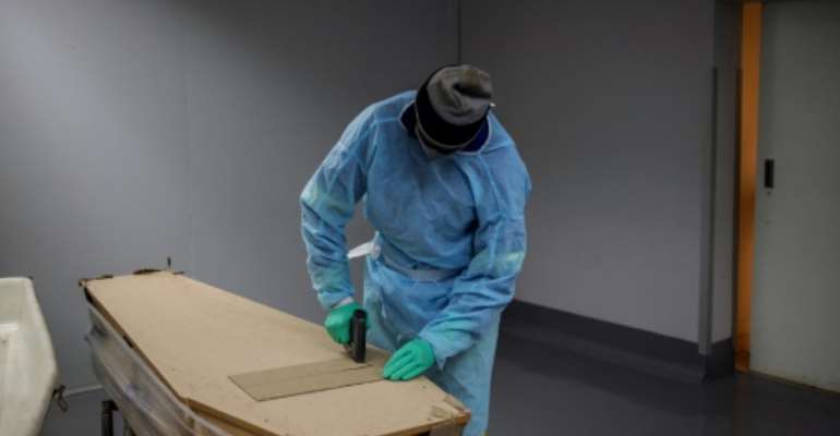 The crippling debts and anxiety that the pandemic has brought in its wake are feared to have led to a rise in suicides. By Michele Spatari (AFP/File)