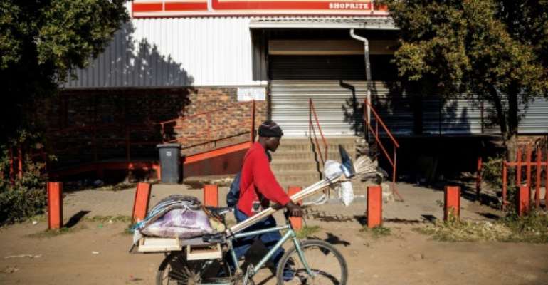 The drop in crime in South Africa during the coronavirus lockdown showed that the ban on alcohol sales reduced offences, the police minister says. By Michele Spatari (AFP/File)