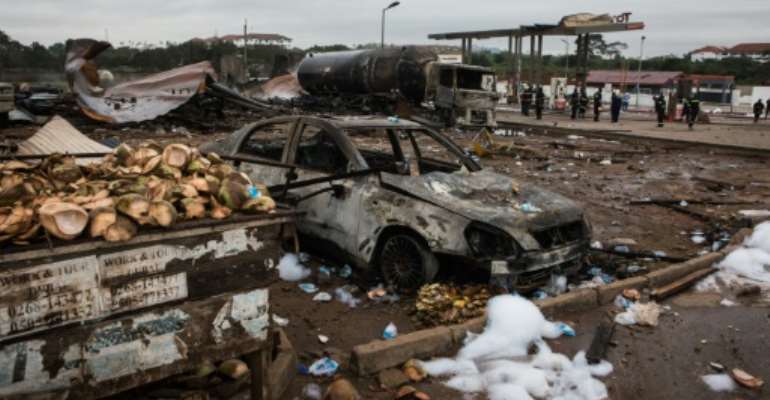 The fire and blasts gutted a liquefied gas filling station and a nearby petrol station in a suburb of Accra.. By Ruth McDowall (AFP)