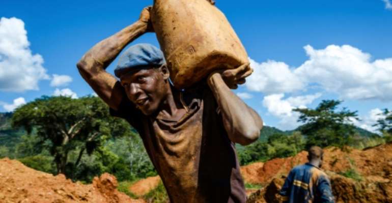 The gold sector provides jobs to nearly 10 percent of the country's population, according to the report by the International Crisis Group.. By Jekesai NJIKIZANA (AFP)