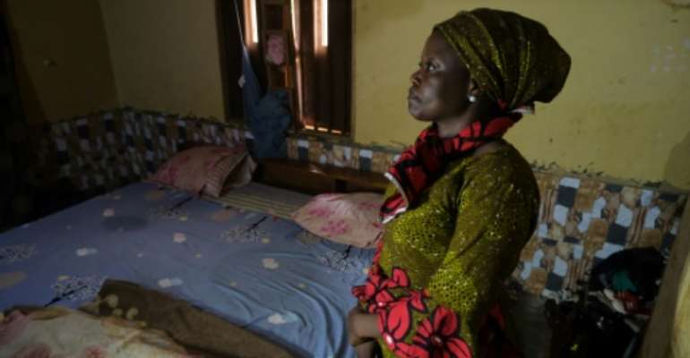 The long wait: Hassana Ayuba, whose 14-year-old daughter Judith was among 140 students kidnapped in Kaduna state last month.  By Kola Sulaimon (AFP)
