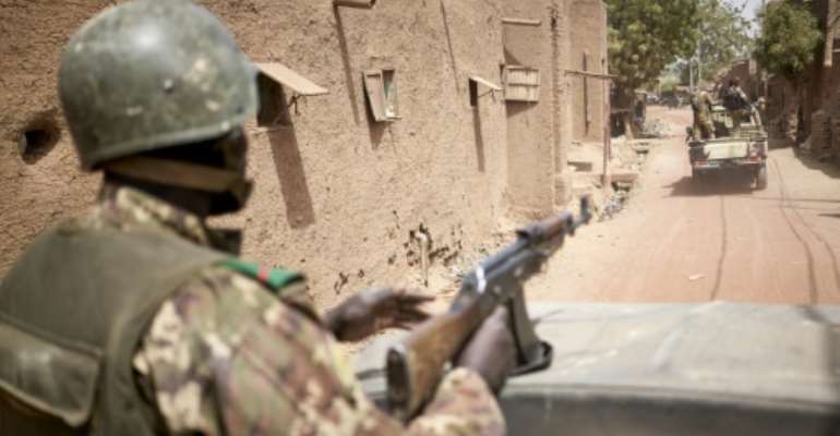 The Malian army has struggled to contain the violence involving jihadists and also inter-communal clashes. By MICHELE CATTANI (AFP)