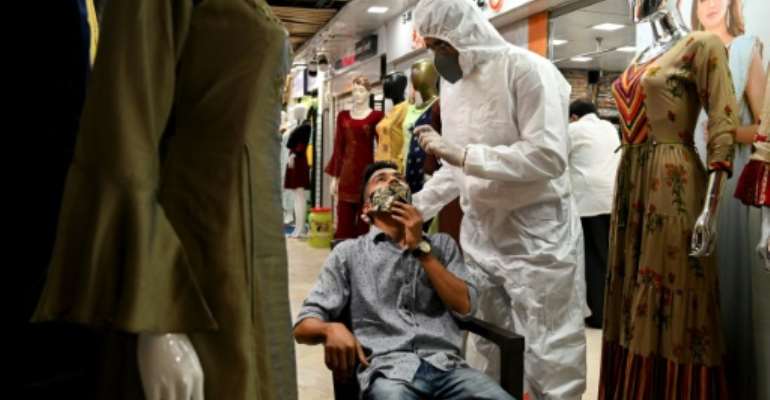 The number of cases in India has crossed nine million. By Punit PARANJPE (AFP)