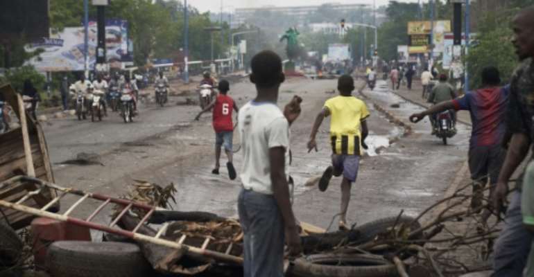 The political standoff has led to deadly clashes between security forces and protesters. By MICHELE CATTANI (AFP)