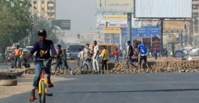 The protests in Sudan come amid soaring inflation, power cuts and bread shortages. By ASHRAF SHAZLY (AFP)