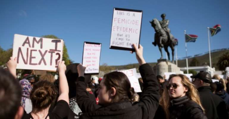 The rally was prompted by two recent high profile murders of women. By RODGER BOSCH (AFP)