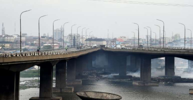 The Third Mainland Bridge is a key link to the city's business district and is going to partially closed for months for repairs. By PIUS UTOMI EKPEI (AFP)