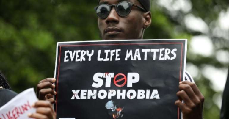 The violence prompted protests in Nigeria. By KOLA SULAIMON (AFP)
