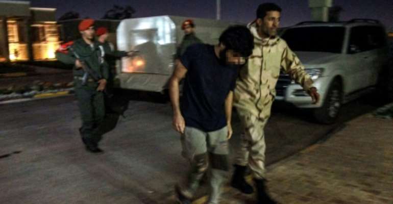 The warring sides in Libya have taken hundreds of prisoners, particularly during an abortive 2019-20 offensive by eastern forces on the capital Tripoli that was followed by a still fragile October ceasefire. By Abdullah DOMA (AFP)