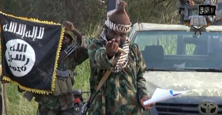 A screengrab taken on October 2, 2014 from a video released by Boko Haram and obtained by AFP shows the leader of the Nigerian Islamist extremist group, Abubakar Shekau. By (Boko Haram/AFP/File)
