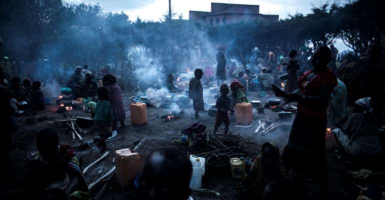 Thousands of people took refuge in the grounds of a Catholic church in Drodro as fighting raged in Djugu territory last July. By John WESSELS (AFP)