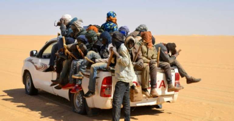 Trucks carrying migrants north frequently breakdown in the desert or become lost, with smugglers sometimes abandoning people to their fates. By SOULEMAINE AG ANARA (AFP)