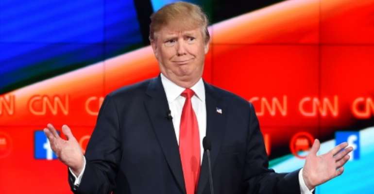 Donald Trump's call for a 'shutdown' on Muslims entering the US has been used in a jihadist recruitment video, a monitoring group says. By Robyn Back (AFP)