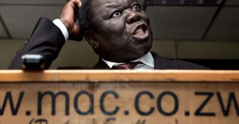 Zimbabwe main opposition leader Morgan Tsvangirai of the Movement for Democratic Change (MDC) gives a press conference in Harare March 25, 2014. By Jekesai Njikizana (AFP/File)