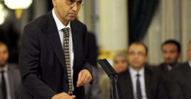 Tunisian Education Minister Salem Labiadh takes an oath of office on March 13, 2013 at the Carthage Palace in Tunis. By Fethi Belaid (AFP/File)