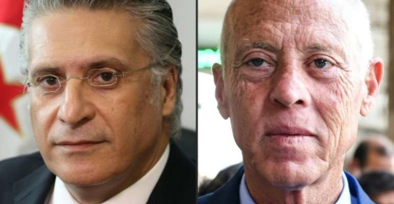 Tunisia presidential frontrunners Nabil Karoui, (L) a media magnate jailed on corruption charges, and law professor Kais Saied. By Hasna, FETHI BELAID (AFP/File)