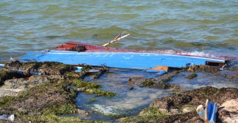 A picture taken on August 29, 2014 shows what remains of a boat carrying illegal migrants from Libya that sank off the shores of the coastal town of Ben Guerdane, in southeast Tunisia. By F. Nasri (AFP/File)