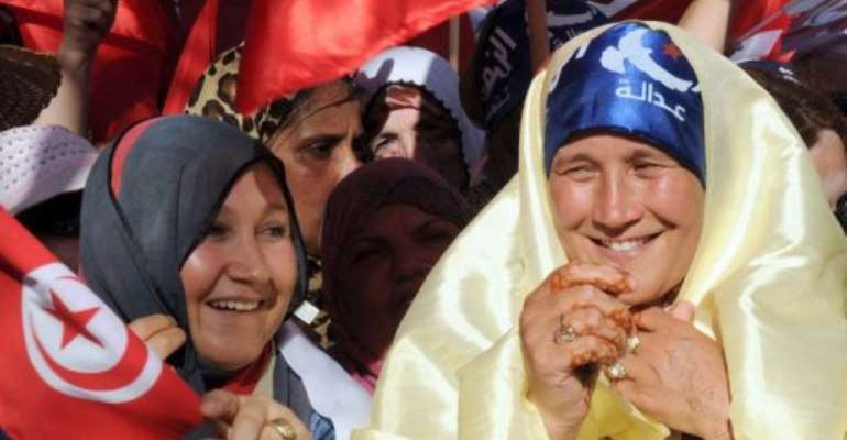 Ennahdha party supporters at a rally on Habib Bourguiba avenue, in Tunis, on August 13, 2013. By Fethi Belaid (AFP)