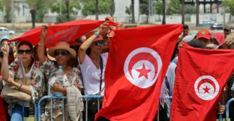 Tunisians pack a the Djellaz cemetery in Tunis on July 27, 2019 for the final farewell to president Beji Caid Essebsi, the country first democratically elected head of state who died on Thursday aged 92. By Anis MILI (AFP)