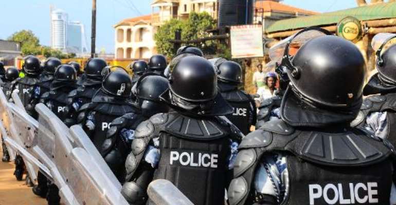 Ugandan anti-riot police patrol the streets of Kampala on April 26, 2012. By Kasamani Isaac (AFP/File)