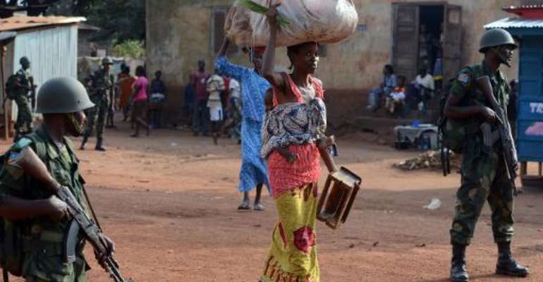 MISCA peacekeepers patrol in a street in Bangui on Febuary 4, 2014. By Issouf Sanogo (AFP)