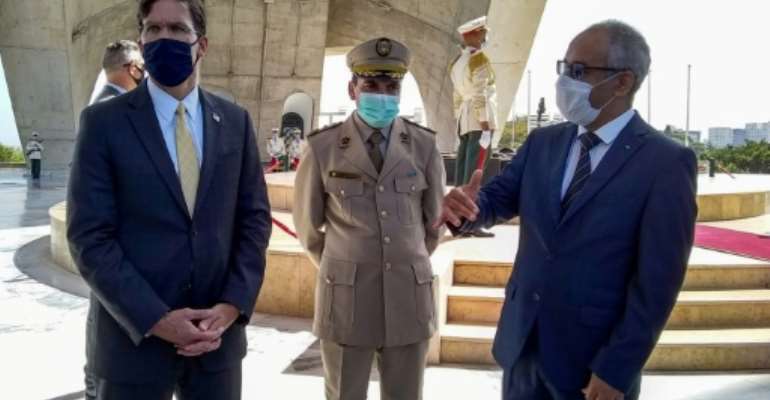 US Defense Secretary Mark Esper (L) prepares to lay a wreath at the Martyrs' Memorial in the Algerian capital. By Sylvie LANTEAUME (AFP)