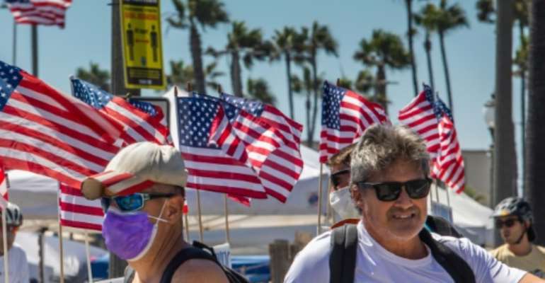 US President Donald Trump has come out in favor of face masks to fight the coronavirus after refusing to encourage them for months. By Apu GOMES (AFP)