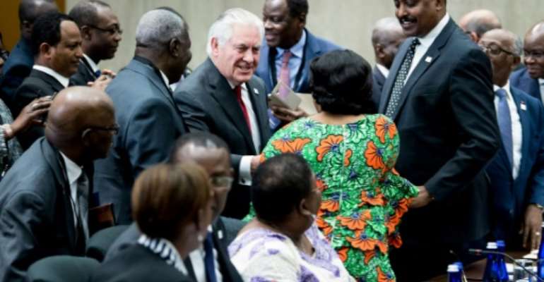 US Secretary of State Rex Tillerson greets participants during a meeting of African leaders at the State Department on November 17, 2017. By Brendan Smialowski (AFP)
